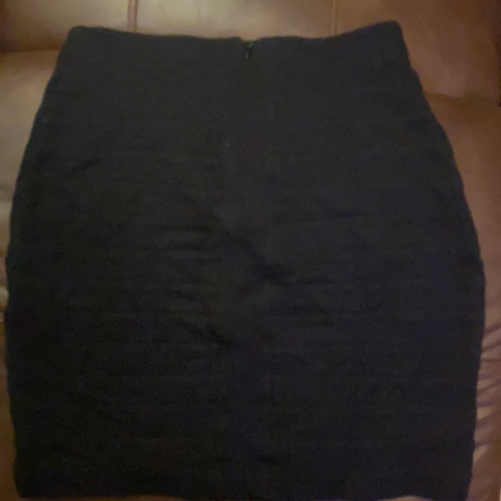 Gently used black stretch Express skirt size 2